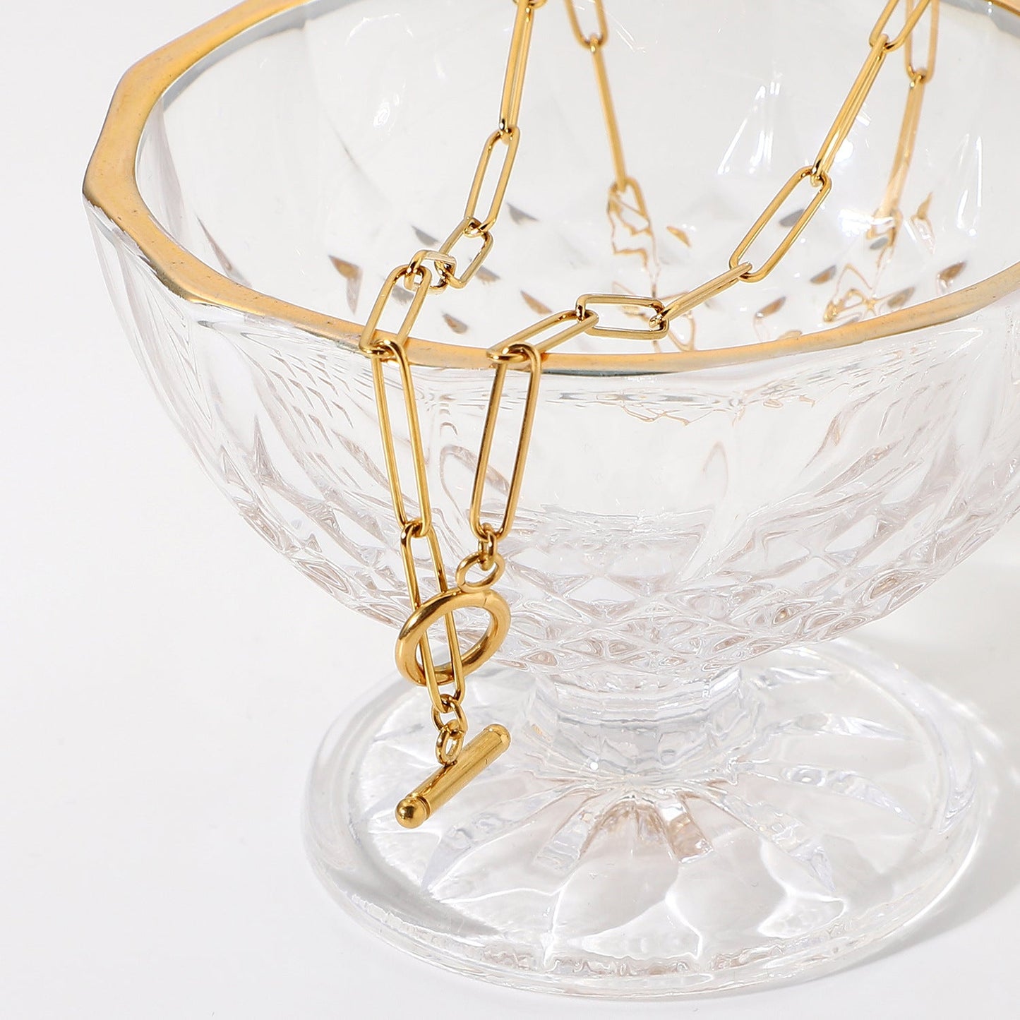 Gold Necklace with Elegant Design and Charm